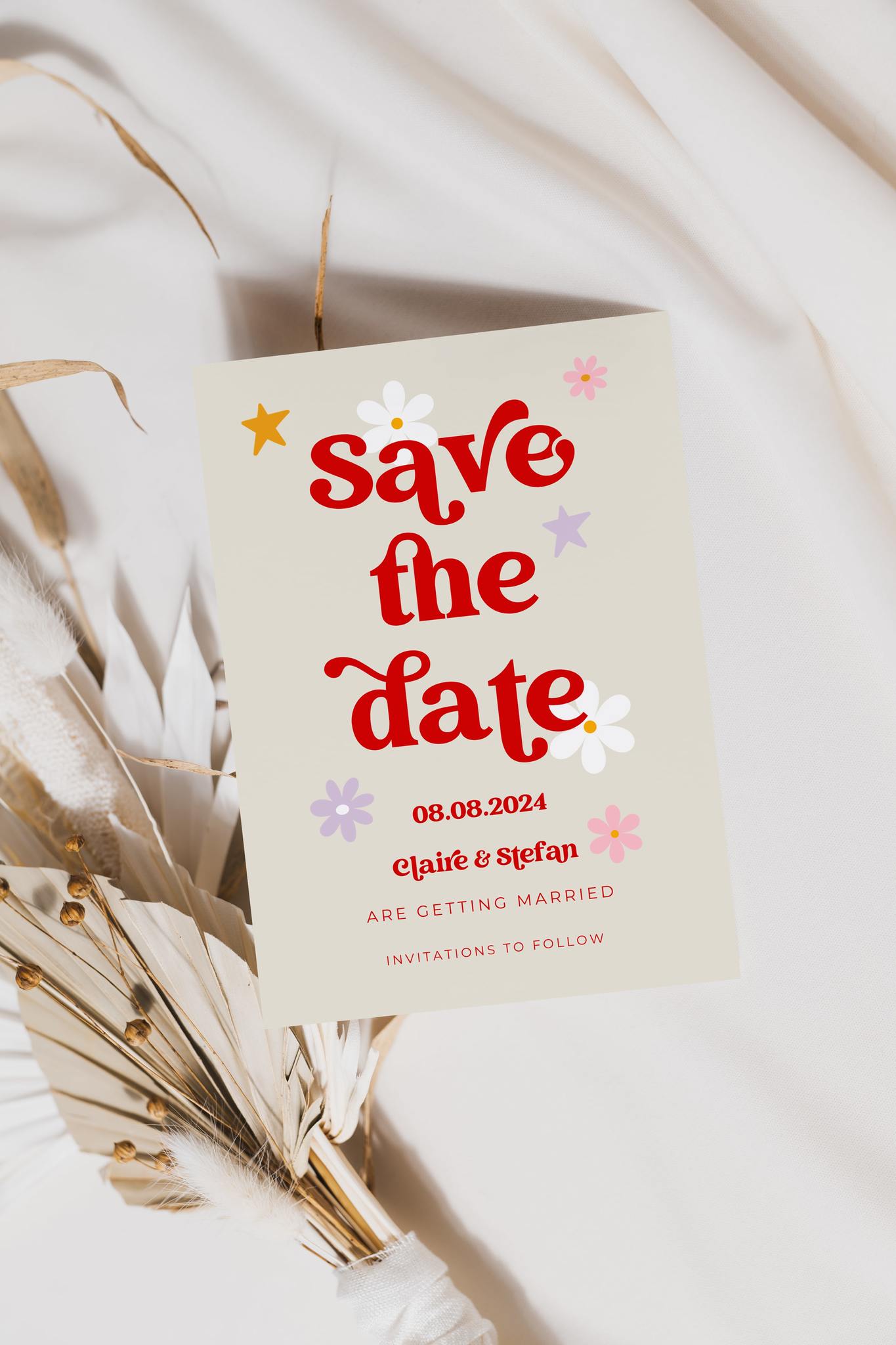 Colourful vintage style save the date card wit flowers and colourful stars