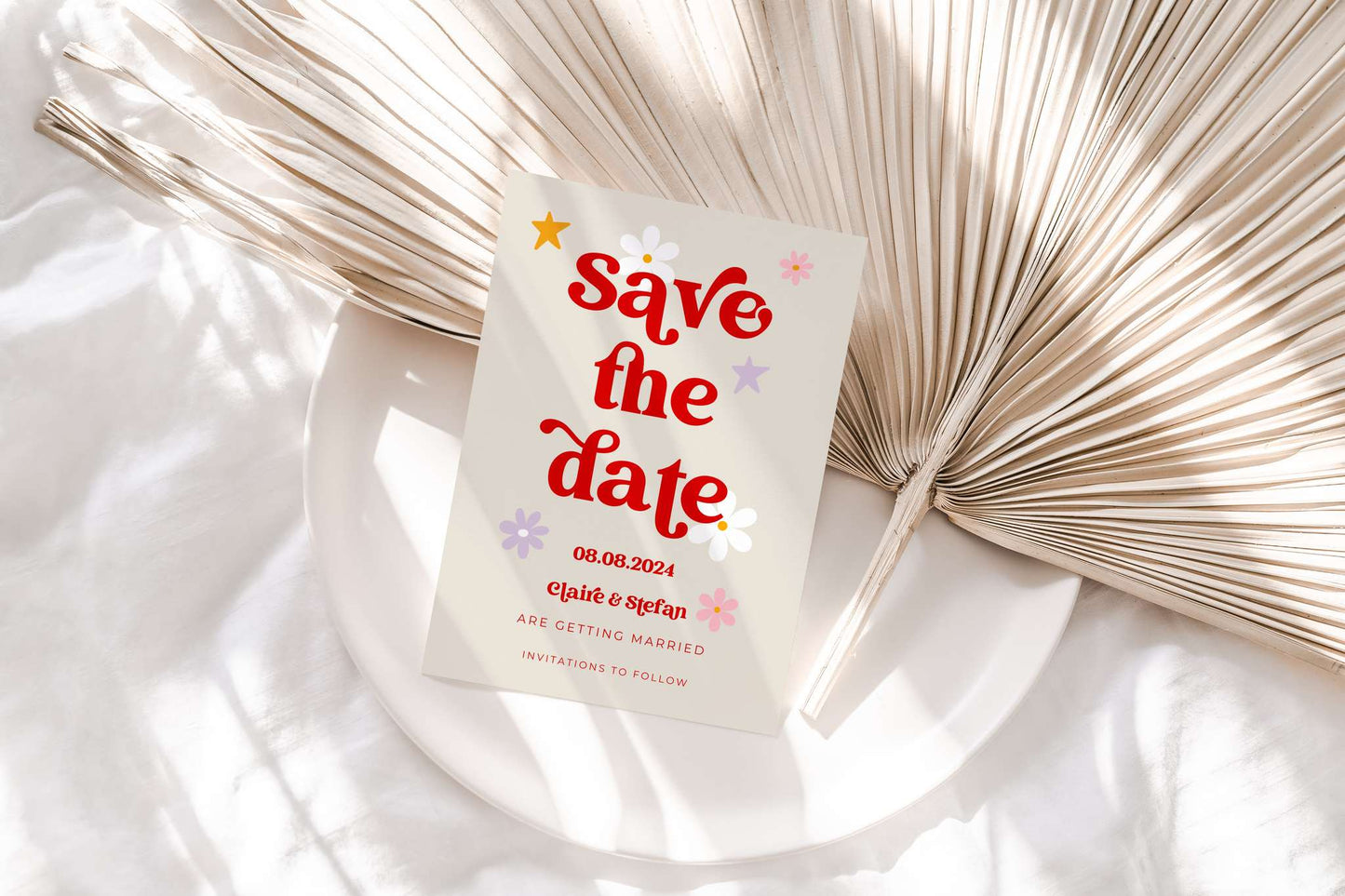 Retro style save the date card with red vintage writing 