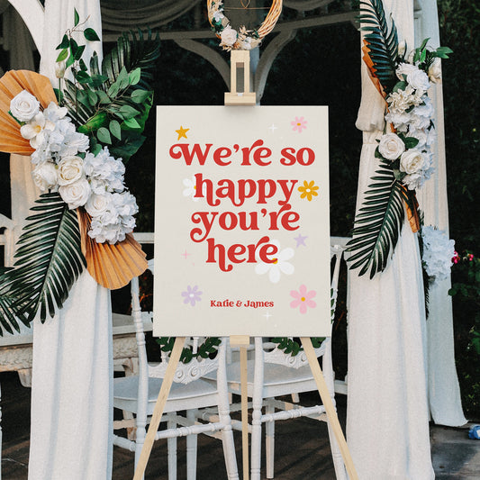 We're so happy you're here sign