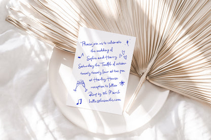 A handwritten wedding invitaiton featuring a white background and blue font