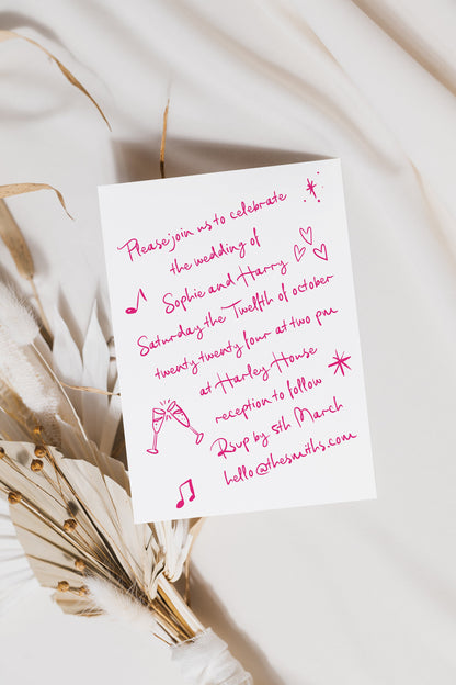 A handwritten wedding invitation featuring pink doodle font on a white background